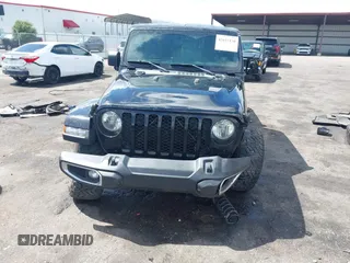 2021 Jeep Gladiator Sport S with VIN 1C6JJTAM3ML546307, listed as a IAAI auction lot 42635138 with Not provided miles and . Bid and sale history available at DreamBid. Image 6.