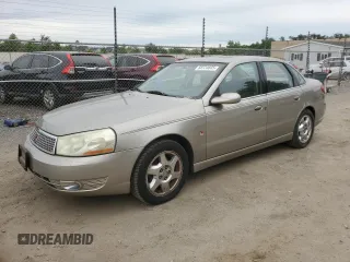 2003 Saturn LS z VIN 1G8JW54R43Y571225, wystawiony jako Copart lot #58724605 z przebiegiem 62 252 mil mil oraz Czysty tytuł • Clean title. Historia ofert i sprzedaży dostępna na DreamBid. Obrazek 1.