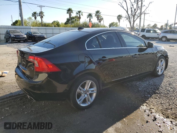 2015 Volvo S60 T5 Drive-E Premier with VIN YV140MFK4F2338462, listed as a Copart auction lot 48485665 with 57,695 mi miles and Salvage title. Bid and sale history available at DreamBid. Image 3.