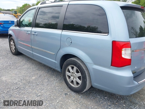 2013 Chrysler Town & Country Touring with VIN 2C4RC1BG6DR526577, listed as a IAAI auction lot 42204456 with 179,696 mi miles and . Bid and sale history available at DreamBid. Image 3.