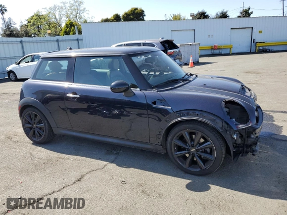 2013 MINI Hardtop S with VIN WMWSV3C5XDT396202, listed as a Copart auction lot 52175055 with 50,701 mi miles and Salvage Title. Bid and sale history available at DreamBid. Image 4.