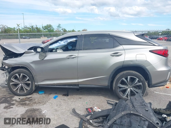 2019 Lexus RX with VIN 2T2ZZMCA1KC131631, listed as a IAAI auction lot 41692742 with 90,161 mi miles. Bid and sale history available at carsss.com. Image 14.