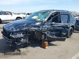 2023 Volkswagen Tiguan SE R-Line Black с VIN 3VVCB7AX9PM014564, выставлен на аукционе IAAI как лот 41993740 с пробегом Не указан миль и . История ставок и продаж доступна на DreamBid. Изображение 6.
