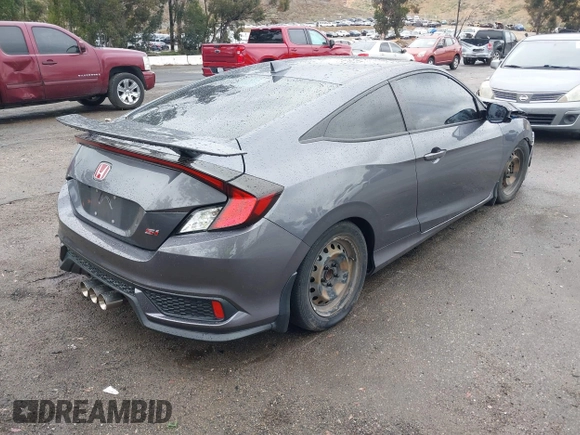 2020 Honda Civic Si with VIN 2HGFC3A57LH753345, listed as a IAAI auction lot 42074785 with 89,069 mi miles and . Bid and sale history available at DreamBid. Image 4.