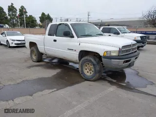 2001 Dodge Ram 1500 with VIN 3B7HF13Z01M555854, listed as a IAAI auction lot 41555752 with 164,111 mi miles. Bid and sale history available at carsss.com. Image 1.