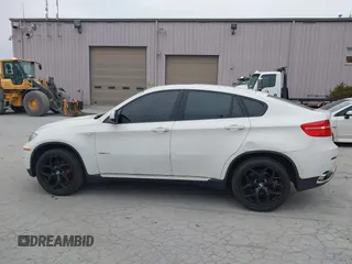 2012 BMW X6 50i z VIN 5UXFG8C53CL590479, wystawiony jako IAAI lot #42021810 z przebiegiem 92 420 mil mil oraz . Historia ofert i sprzedaży dostępna na DreamBid. Obrazek 14.