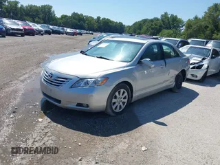2007 Toyota Camry LE with VIN 4T1BK46K47U500034, listed as a IAAI auction lot 40120574 with 137,418 mi miles and . Bid and sale history available at DreamBid. Image 2.