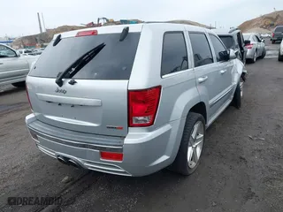 2007 Jeep Grand Cherokee SRT-8 with VIN 1J8HR78367C649237, listed as a IAAI auction lot 42019555 with 101,967 mi miles. Bid and sale history available at carsss.com. Image 4.