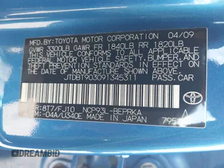 2009 Toyota Yaris with VIN JTDBT903091345311, listed as a IAAI auction lot 40269675 with 156,874 mi miles. Bid and sale history available at carsss.com. Image 9.