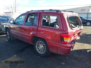 2002 Jeep Grand Cherokee Limited with VIN 1J4GX58S82C228062, listed as a IAAI auction lot 41657705 with 168,991 mi miles and . Bid and sale history available at DreamBid. Image 3.