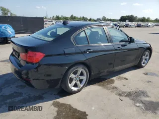 2015 BMW 3 Series 328i with VIN WBA3A5C57FP605385, listed as a Copart auction lot 54703705 with 129,294 mi miles and Salvage title. Bid and sale history available at DreamBid. Image 3.