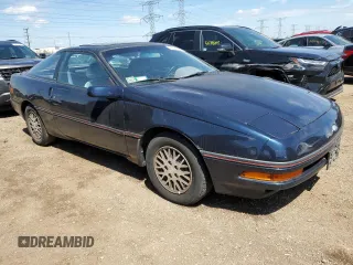 1989 Ford Probe z VIN 1ZVBT21C9K5202343, wystawiony jako Copart lot #55885985 z przebiegiem 150 457 mil mil oraz Czysty tytuł • Clean title. Historia ofert i sprzedaży dostępna na DreamBid. Obrazek 4.