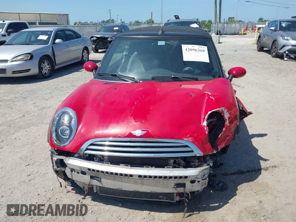 2006 MINI Convertible with VIN WMWRF33556TG14466, listed as a IAAI auction lot 42096368 with 120,230 mi miles and . Bid and sale history available at DreamBid. Image 13.