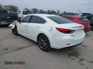 2017 Mazda 6 Grand Touring with VIN JM1GL1W57H1126716, listed as a IAAI auction lot 41619715 with 105,332 mi miles and . Bid and sale history available at DreamBid. Image 3.