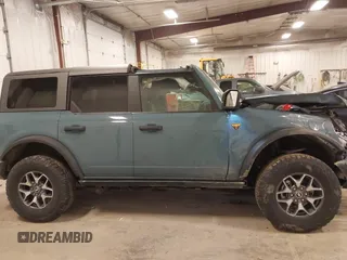 2022 Ford Bronco z VIN 1FMEE5DP8NLB54954, wystawiony jako IAAI lot #42038688 z przebiegiem 45 182 mil mil oraz . Historia ofert i sprzedaży dostępna na DreamBid. Obrazek 13.
