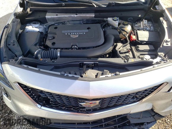 2021 Cadillac XT4 FWD Sport with VIN 1GYFZER41MF006261, listed as a Copart auction lot 45553664 with 14,402 mi miles and . Bid and sale history available at DreamBid. Image 12.