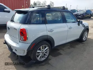 2013 MINI Countryman S with VIN WMWZC3C55DWP24628, listed as a IAAI auction lot 42558387 with 169,269 mi miles and . Bid and sale history available at DreamBid. Image 4.