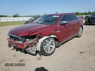2014 Ford Taurus Limited z VIN 1FAHP2F82EG141034, wystawiony jako Copart lot #52579995 z przebiegiem 207 709 mil mil oraz Szkody całkowita. Historia ofert i sprzedaży dostępna na DreamBid. Obrazek 1.