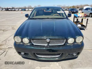 2008 Jaguar XJ with VIN SAJWA79B08SH23050, listed as a Copart auction lot 47886605 with 55,463 mi miles and Salvage Title. Bid and sale history available at carsss.com. Image 5.