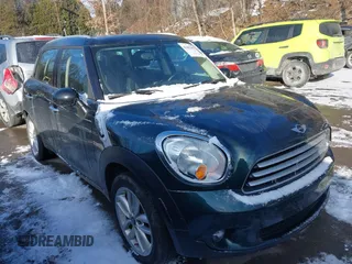 2013 MINI Cooper Countryman with VIN WMWZB3C53DWM08700, listed as a IAAI auction lot 41402093 with 71,109 mi miles. Bid and sale history available at carsss.com. Image 1.