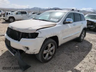 2012 Jeep Grand Cherokee Overland with VIN 1C4RJFCG9CC199486, listed as a Copart auction lot 51942135 with 113,098 mi miles and Salvage Title. Bid and sale history available at carsss.com. Image 1.