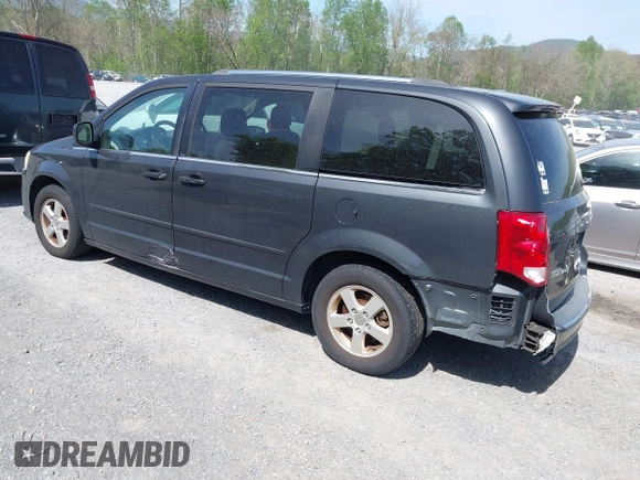 2011 Dodge Grand Caravan Crew with VIN 2D4RN5DG1BR790613, listed as a IAAI auction lot 42106380 with 188,528 mi miles and . Bid and sale history available at DreamBid. Image 3.