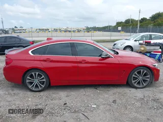 2019 BMW 4 Series 430i with VIN WBA4J1C52KBM16194, listed as a IAAI auction lot 41985890 with 74,788 mi miles and . Bid and sale history available at carsss.com. Image 14.