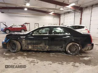 2010 Cadillac STS AWD with VIN 1G6DU6EV2A0125065, listed as a IAAI auction lot 41229886 with 84,954 mi miles and . Bid and sale history available at DreamBid. Image 15.