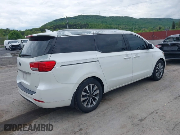 2015 Kia Sedona EX with VIN KNDMC5C14F6019067, listed as a IAAI auction lot 42045357 with 149,736 mi miles. Bid and sale history available at carsss.com. Image 4.