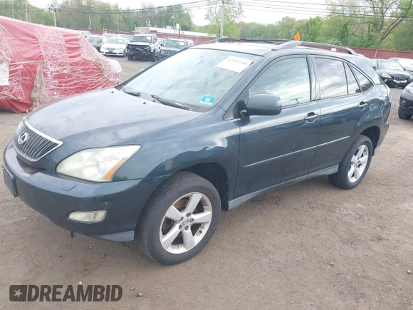 2006 Lexus RX 330 with VIN 2T2HA31U56C090677, listed as a IAAI auction lot 42182540 with 216,676 mi miles. Bid and sale history available at carsss.com. Image 2.