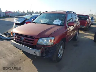 2006 Toyota Highlander w/3rd Row with VIN JTEDP21A060106758, listed as a IAAI auction lot 41441477 with 154,143 mi miles. Bid and sale history available at carsss.com. Image 2.