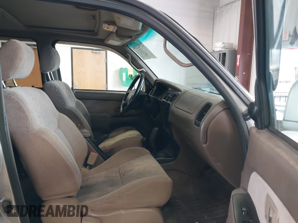 1999 Toyota 4Runner SR5 z VIN JT3HN86R8X0221532, wystawiony jako IAAI lot #41902556 z przebiegiem 406 602 mil mil oraz . Historia ofert i sprzedaży dostępna na DreamBid. Obrazek 5.