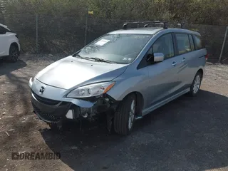 2012 Mazda 5 Grand Touring with VIN JM1CW2DL6C0138979, listed as a IAAI auction lot 41936188 with 57,963 mi miles and . Bid and sale history available at carsss.com. Image 12.