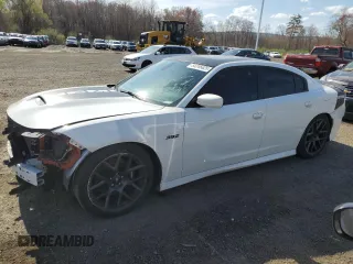 2019 Dodge Charger Scat Pack with VIN 2C3CDXGJ5KH558762, listed as a Copart auction lot 54245625 with 57,123 mi miles and Clean Title. Bid and sale history available at DreamBid. Image 1.