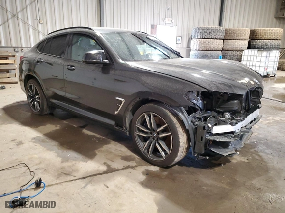 2022 BMW X4 M with VIN 5YM23EC05N9J23246, listed as a Copart auction lot 48730835 with 0 mi miles and Salvage Title. Bid and sale history available at carsss.com. Image 4.