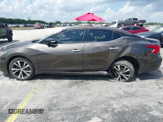 2016 Nissan Maxima SR with VIN 1N4AA6AP9GC405420, listed as a IAAI auction lot 41933739 with 59,680 mi miles and . Bid and sale history available at DreamBid. Image 14.