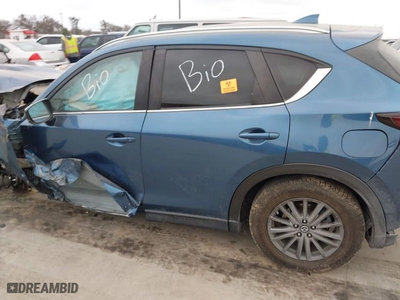 2019 Mazda CX-5 Touring with VIN JM3KFACM0K1509957, listed as a IAAI auction lot 41532933 with NaN miles. Bid and sale history available at carsss.com. Image 13.