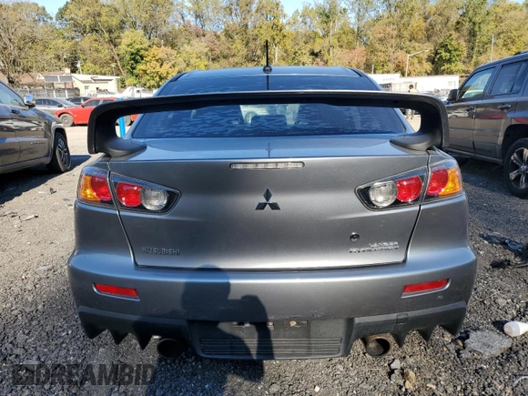 2014 Mitsubishi Lancer Evolution GSR z VIN JA32W8FV6EU018171, wystawiony jako Copart lot #77109934 z przebiegiem 83 467 mil mil oraz Tytuł czysty. Historia ofert i sprzedaży dostępna na DreamBid. Obrazek 6.