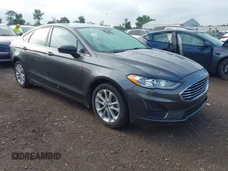 2020 Ford Fusion SE z VIN 3FA6P0LUXLR219515, wystawiony jako IAAI lot #42635653 z przebiegiem 104 515 mil mil oraz . Historia ofert i sprzedaży dostępna na DreamBid. Obrazek 1.