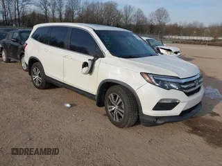2017 Honda Pilot EX-L z VIN 5FNYF6H77HB089326, wystawiony jako IAAI lot #41815435 z przebiegiem 177 804 mil mil oraz . Historia ofert i sprzedaży dostępna na DreamBid. Obrazek 1.