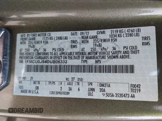 2013 Ford Escape Titanium with VIN 1FMCU0J94DUB06332, listed as a IAAI auction lot 41824742 with 92,633 mi miles. Bid and sale history available at carsss.com. Image 9.