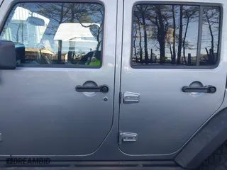 2015 Jeep Wrangler Unlimited Rubicon Hard Rock with VIN 1C4HJWFG1FL777222, listed as a IAAI auction lot 41843893 with 74,718 mi miles. Bid and sale history available at carsss.com. Image 14.