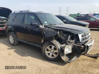2010 Ford Escape Limited z VIN 1FMCU9EG7AKC73014, wystawiony jako Copart lot #59350805 z przebiegiem 53 032 mil mil oraz Szkoda całkowita • Salvage title. Historia ofert i sprzedaży dostępna na DreamBid. Obrazek 4.