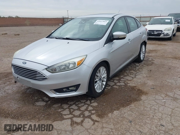 2017 Ford Focus Titanium with VIN 1FADP3J24HL229702, listed as a IAAI auction lot 42057013 with 120,250 mi miles and . Bid and sale history available at DreamBid. Image 18.
