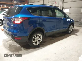 2017 Ford Escape SE with VIN 1FMCU0GD7HUB99218, listed as a IAAI auction lot 41941432 with 92,090 mi miles and . Bid and sale history available at DreamBid. Image 4.