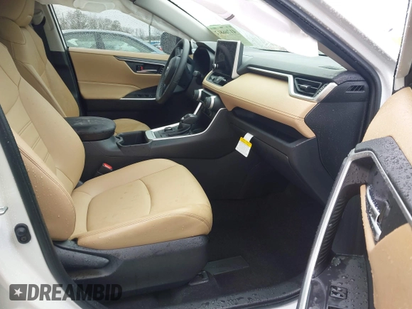 2023 Toyota RAV4 Hybrid XLE Premium with VIN JTMB6RFV4PD114763, listed as a IAAI auction lot 41766812 with 6,768 mi miles. Bid and sale history available at carsss.com. Image 5.