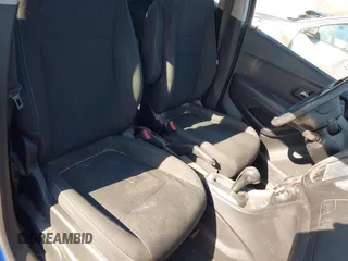 2015 Chevrolet Trax LS with VIN KL7CJKSB4FB086024, listed as a IAAI auction lot 41669572 with 124,312 mi miles. Bid and sale history available at carsss.com. Image 5.