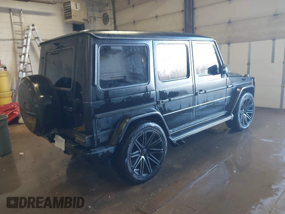2013 Mercedes-Benz G-Class AMG G 63 with VIN WDCYC7DF8DX206305, listed as a IAAI auction lot 41598945 with 97,464 mi miles. Bid and sale history available at carsss.com. Image 4.