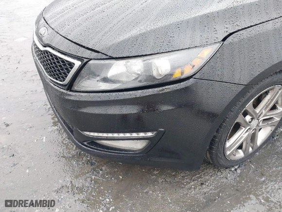 2013 Kia Optima SX w/Limited Pkg with VIN 5XXGR4A68DG189452, listed as a IAAI auction lot 41563636 with 131,241 mi miles. Bid and sale history available at carsss.com. Image 6.
