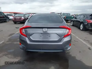 2017 Honda Civic LX with VIN 19XFC2F50HE055888, listed as a IAAI auction lot 42202494 with 147,354 mi miles and . Bid and sale history available at DreamBid. Image 16.